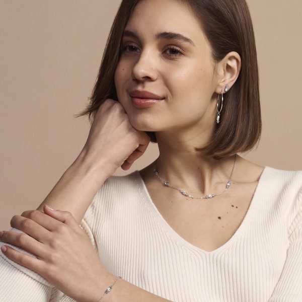 Dainty Silver Tone Hoop Earrings - Image 5